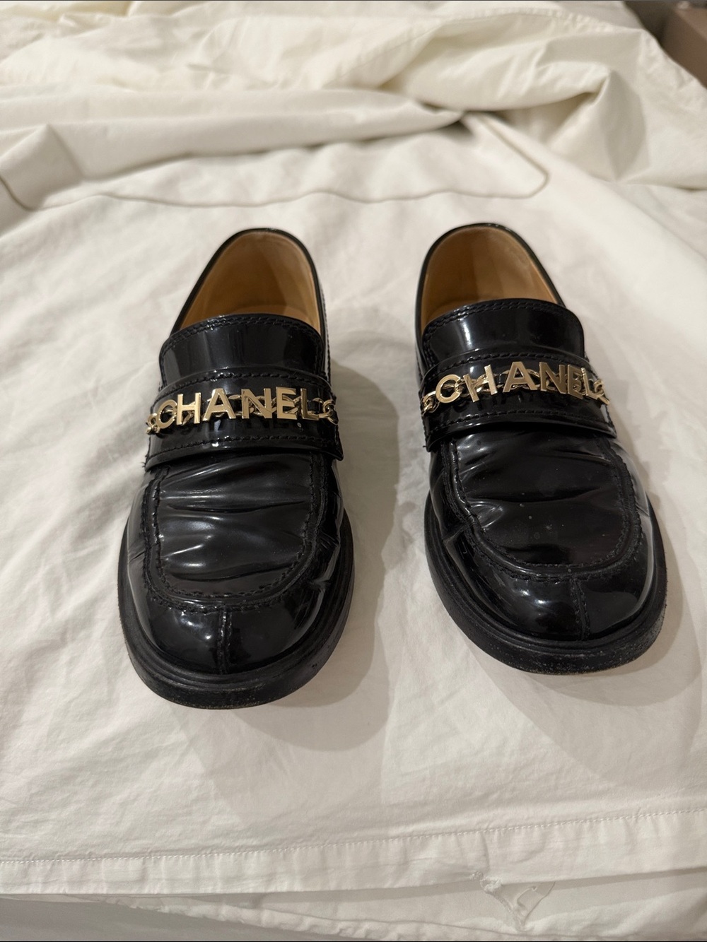 CHANEL Black Patent Leather Logo Strap Slip-On Loafers